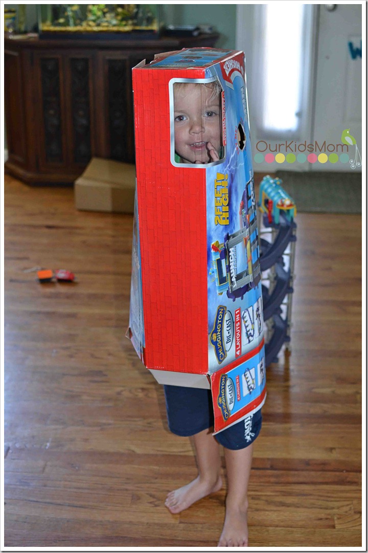 boy playing with box